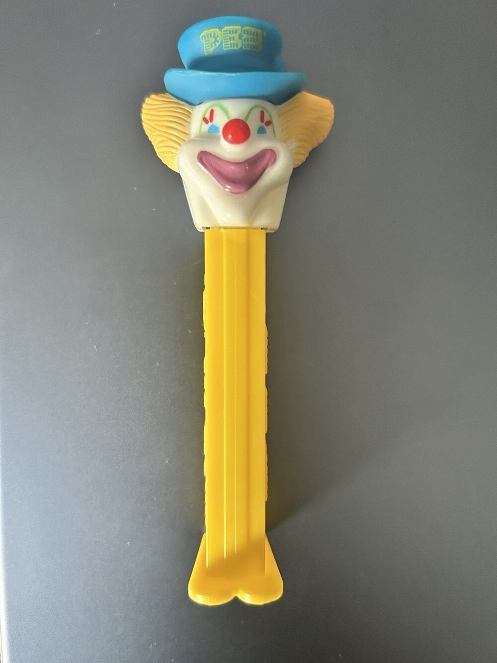 Peter Pez Clown Vintage Pez Dispenser Yellow Stem and Blue Hat